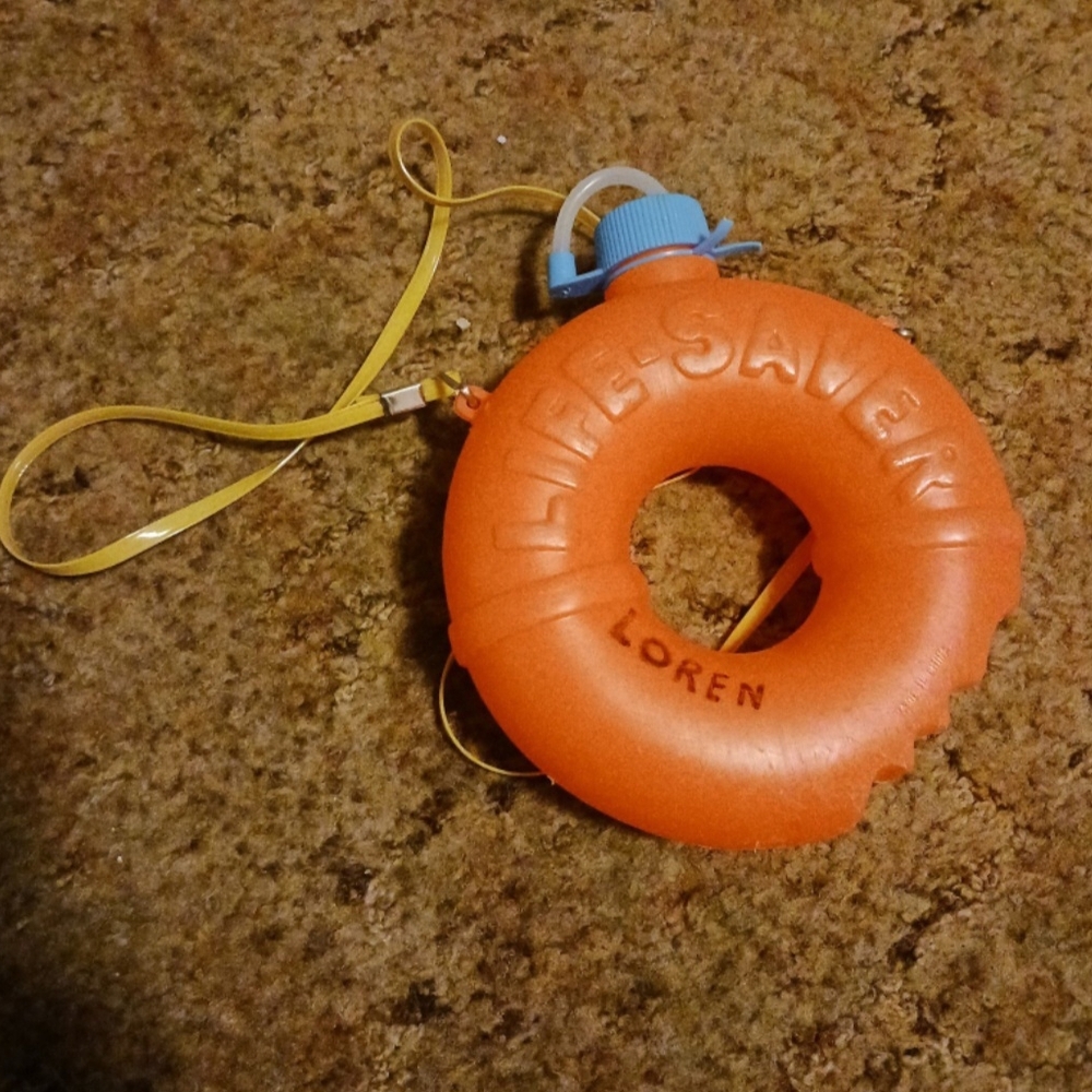 Vintage. 1990s Orange Life Saver water bottle